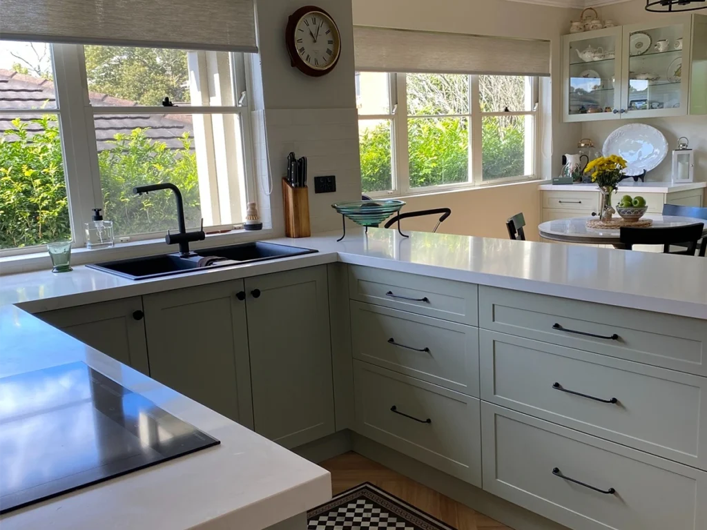 Elegant engineered stone benchtops in Smartstone Leonardo La Vena kitchen makeover by Waratah Kitchens Sydney